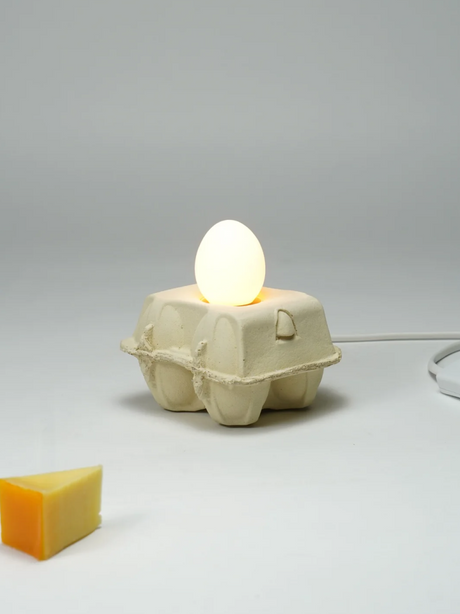 Sustainable LED lamp EggboxLAMP, egg-shaped light source with an original egg carton base
