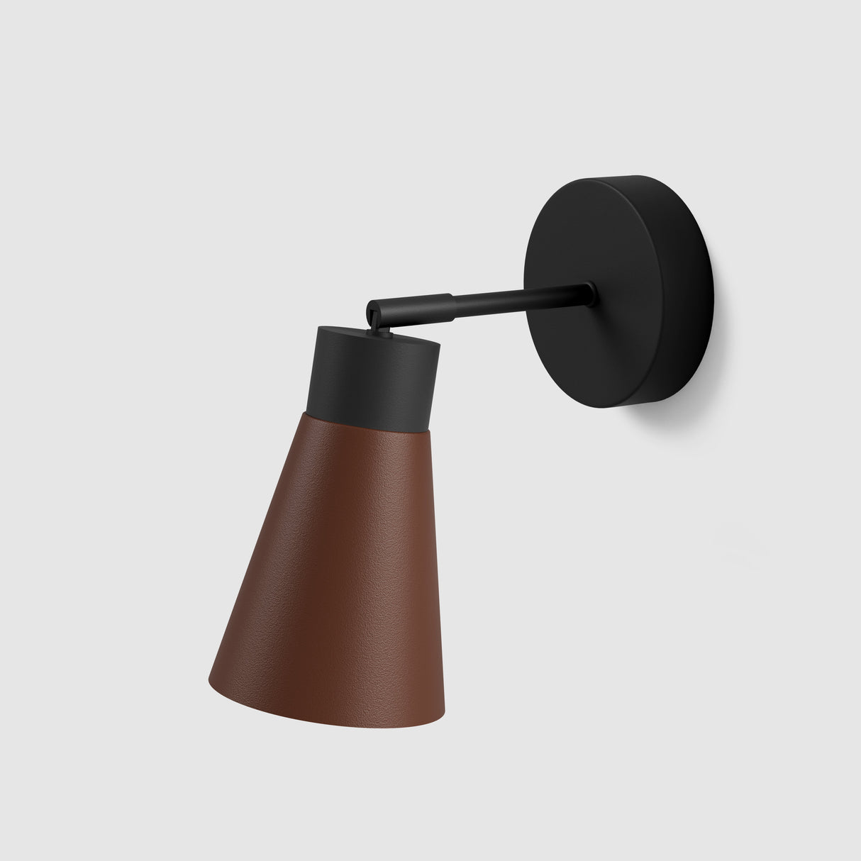 Moderne wandlamp van Studio Monton met een bruin en zwart ontwerp, perfect voor eigentijdse interieurs