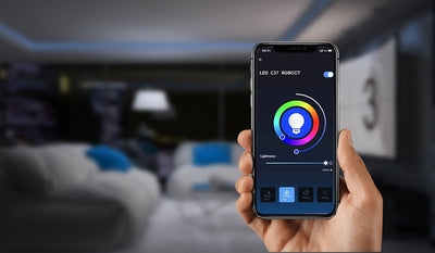 E14 smart LED candle bulb with smart control via smartphone in a modern living room